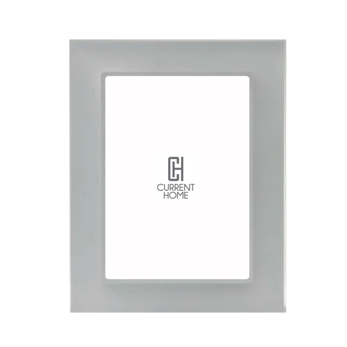 The Bella Moulding Prisma Frame Smoke is a modern acrylic picture frame with a smooth, light gray border and UV-filtering glass to protect your artwork. It features a white placeholder with the Current Home logo in the center.