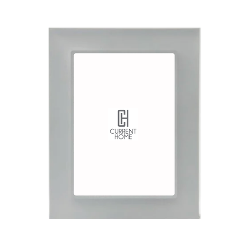 The Bella Moulding Prisma Frame Smoke is a modern acrylic picture frame with a smooth, light gray border and UV-filtering glass to protect your artwork. It features a white placeholder with the Current Home logo in the center.