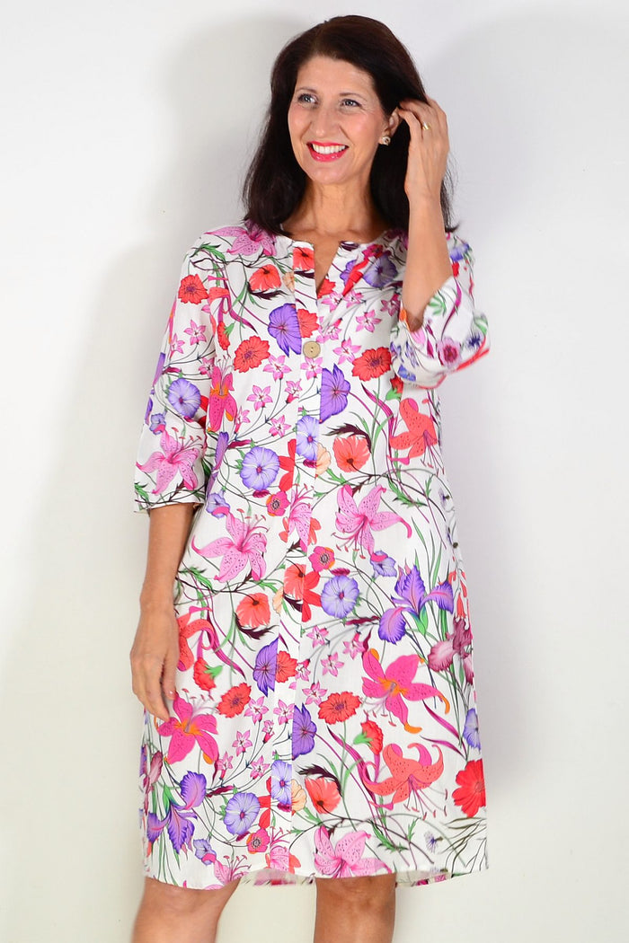 Purple pink floral linen blend tunic by La Mode featuring a relaxed fit and vibrant floral pattern.