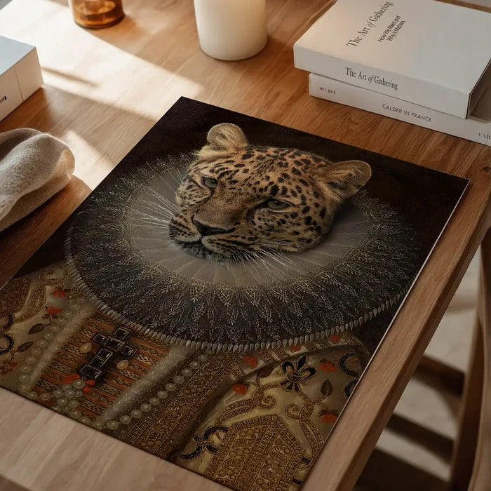 Queen Leopard Portrait Altered Art Print, quirky altered art print unframed on a home office desk