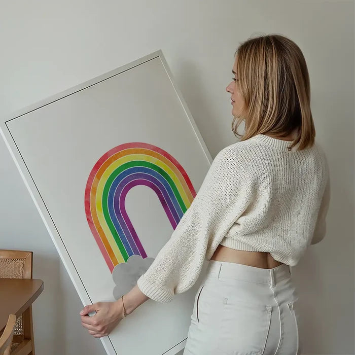 Rainbow Painting Print held up against a living room wall