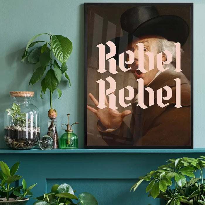 Rebel Rebel Typography Print, quirky altered art print black framed on a living room shelf