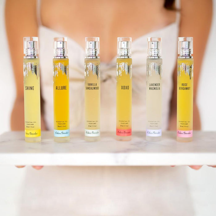 A tray of Edens Garden perfumes