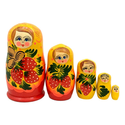 Russian matryoshka yellow with red strawberry