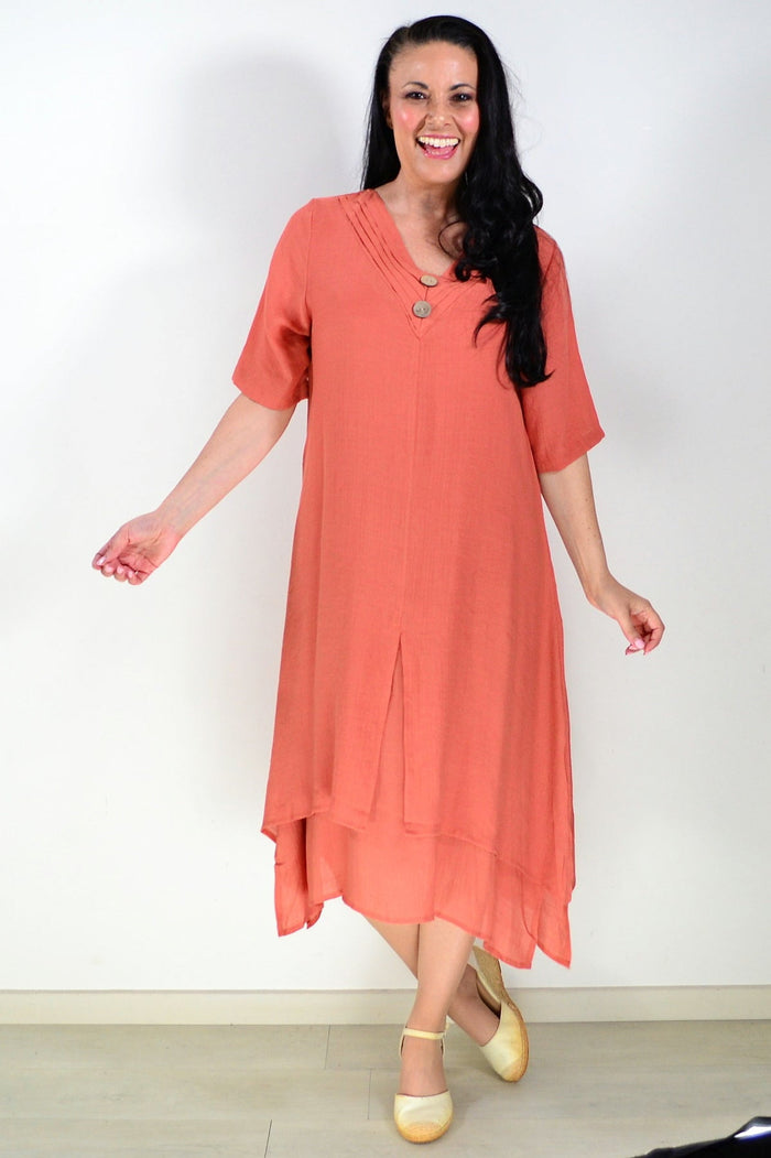 Rust summer tunic dress by La Mode, lightweight sleeveless tunic with a relaxed fit and casual style, shown on a hanger.