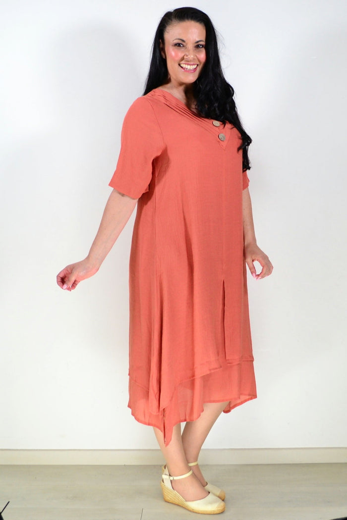 Rust-colored La Mode summer tunic dress with short sleeves and a relaxed fit, displayed on a hanger.
