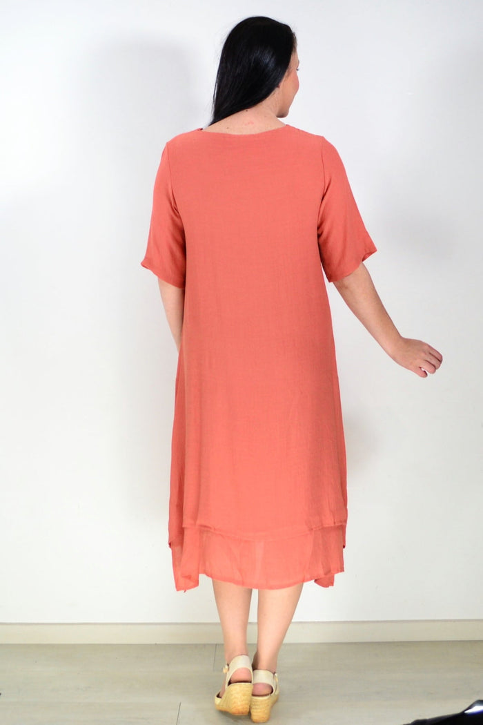 Rust summer tunic dress by La Mode featuring lightweight fabric and casual fit, displayed on a hanger.