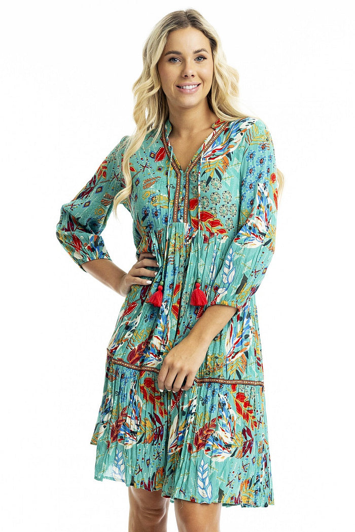 Orientique Serengetti V-neckline trim tunic dress featuring a relaxed fit and stylish design, perfect for casual wear.
