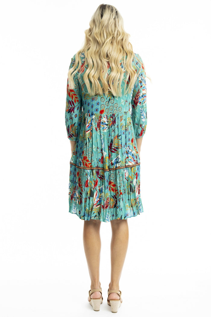 Orientique Serengetti V neckline trim tunic dress displayed with its V-shaped neckline and stylish trim detail.