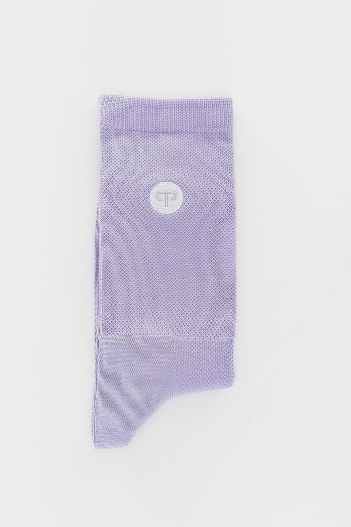 Purple sock with a logo on a light gray background