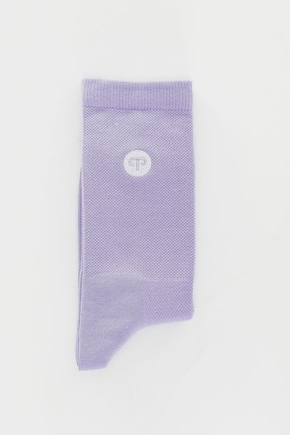 Purple sock with a logo on a light gray background