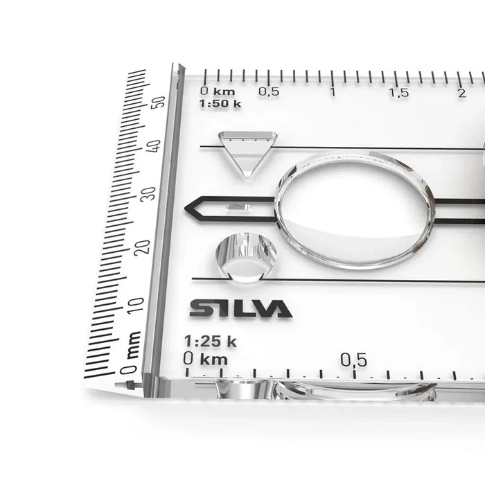 Close-up of Silva 3NL 360 compasses magnifying lens and scale markings