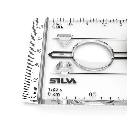 Close-up of Silva 3NL 360 compasses magnifying lens and scale markings