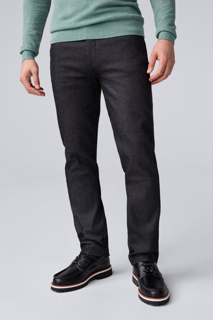 Front view of man wearing SILVER Denim - Straight Leg Jeans in Black Rinse