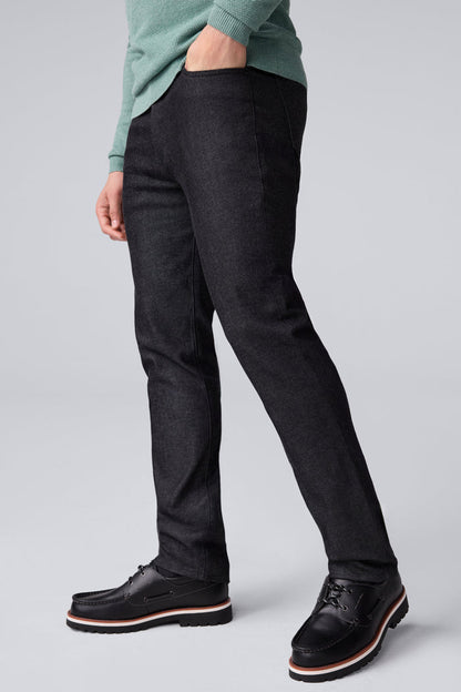 Side view of man wearing SILVER Denim - Straight Leg Jeans in Black Rinse