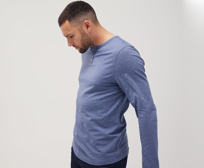Side view of a man wearing Silver Long Sleeve Henley in Moonlighting Heather