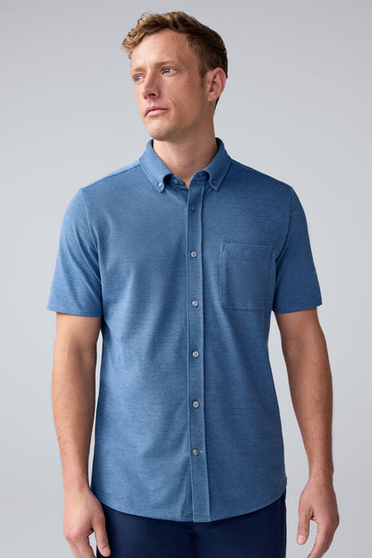 Front view of a man wearing SILVER Pique Short Sleeve Button Up in Total Eclipse Chambray Oxford