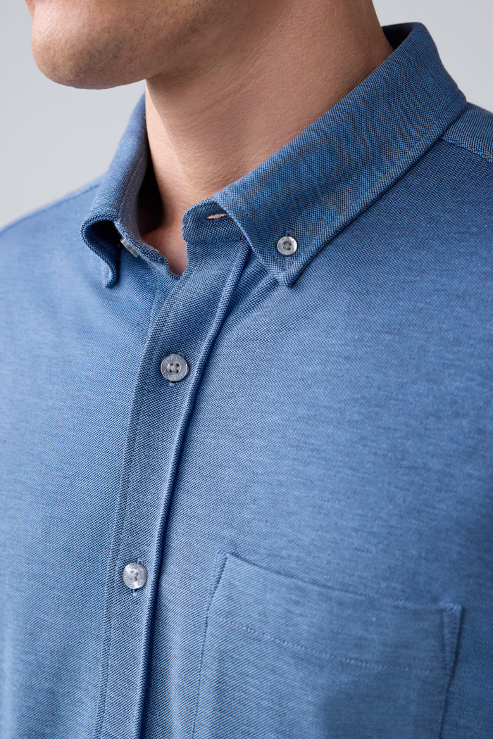 Detailed view of a man wearing SILVER Pique Short Sleeve Button Up in Total Eclipse Chambray Oxford