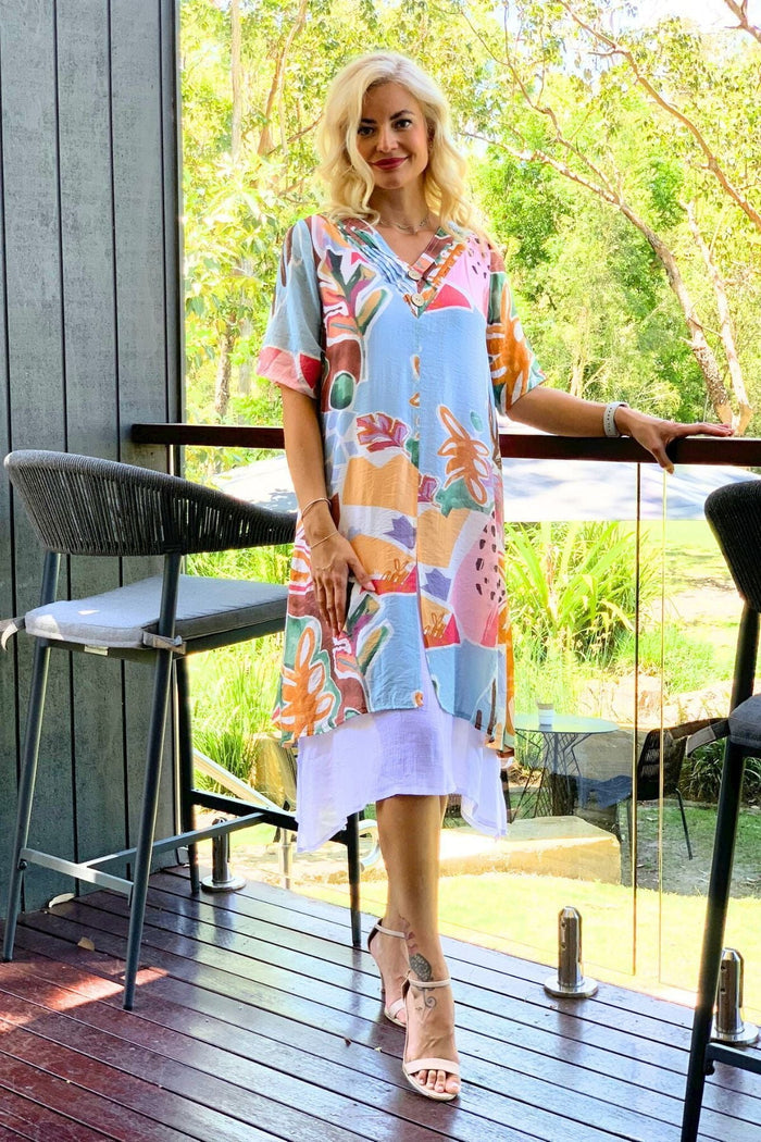 Sky blue floral print summer tunic dress by La Mode, lightweight fabric with vibrant floral pattern and relaxed fit.