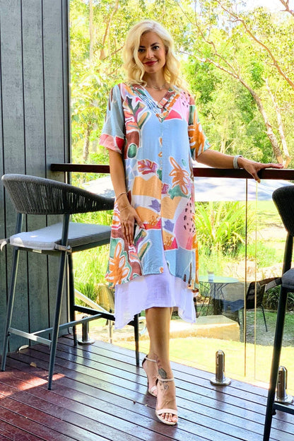 Sky blue floral print summer tunic dress by La Mode, lightweight fabric with vibrant floral pattern and relaxed fit.