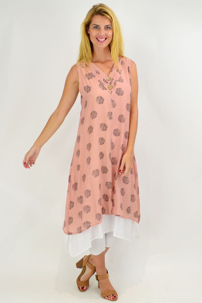 Pink sleeveless tunic dress with black dot overlay, cotton fabric, by La Mode, featuring a relaxed fit and stylish design.
