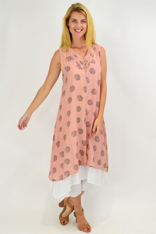 Pink sleeveless tunic dress with black dot overlay, cotton fabric, by La Mode, featuring a relaxed fit and stylish design.