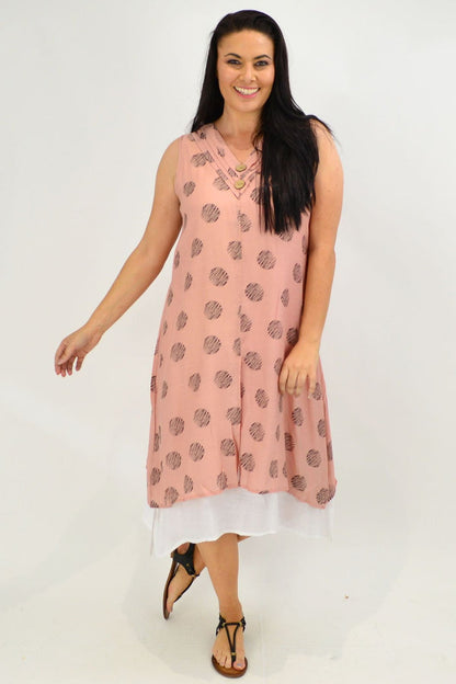 Sleeveless dusty pink tunic dress with black dot overlay, cotton fabric, from La Mode, featuring a relaxed fit and stylish design.