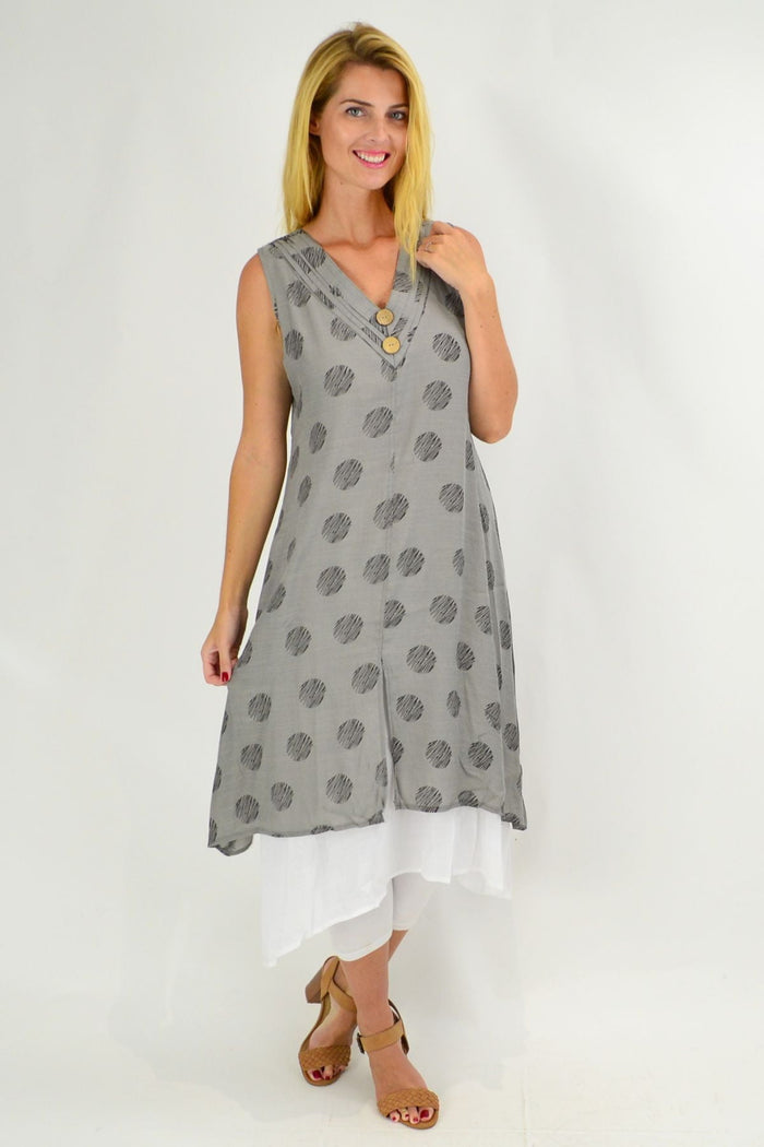 Sleeveless grey dots overlay tunic dress by La Mode, featuring a stylish and comfortable design with a relaxed fit.