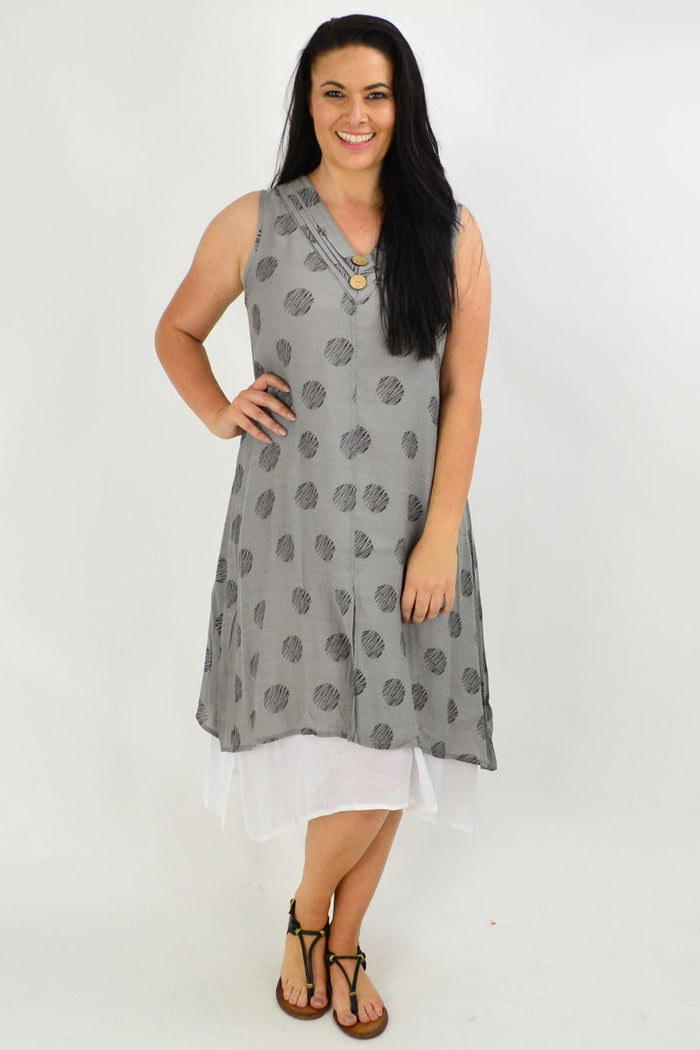 Sleeveless grey dots overlay tunic dress by La Mode, featuring a stylish and comfortable design with a relaxed fit.