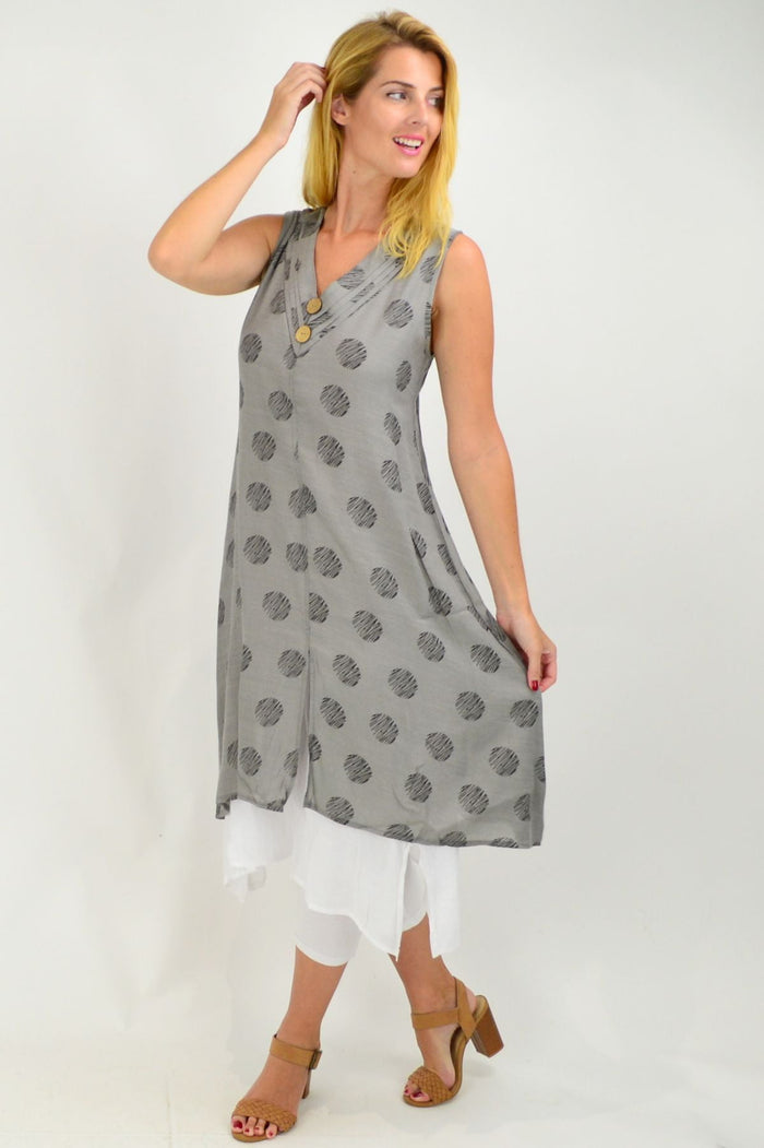 Gray sleeveless tunic dress with dotted overlay from La Mode, showcasing a relaxed fit and stylish design.