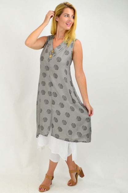 Gray sleeveless tunic dress with dotted overlay from La Mode, showcasing a relaxed fit and stylish design.
