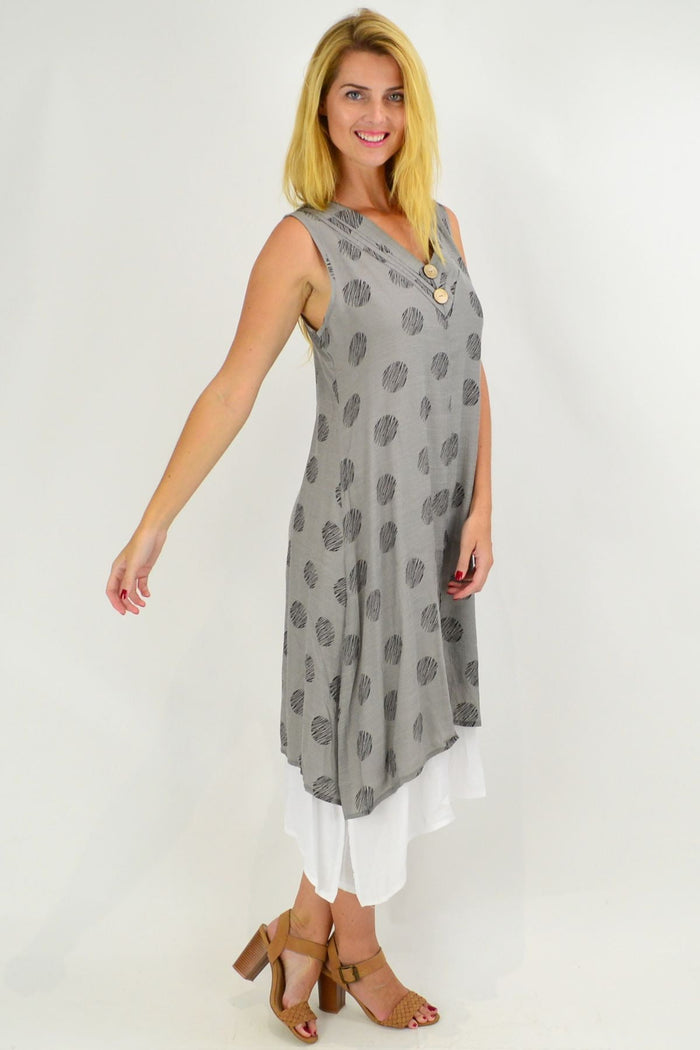 Sleeveless grey dots overlay tunic dress by La Mode, featuring a relaxed fit and stylish design, shown on a model.