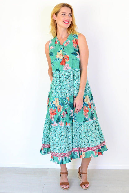 Orientique Sleeveless Kaleici Floral Tunic dress with vibrant floral pattern and lightweight fabric, perfect for casual summer wear.