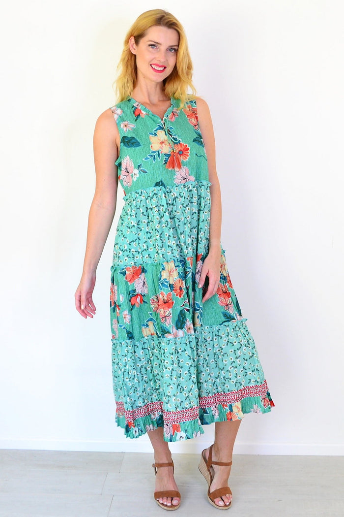 Sleeveless Kaleici floral tunic dress by Orientique, showing vibrant floral pattern and lightweight fabric on a model.