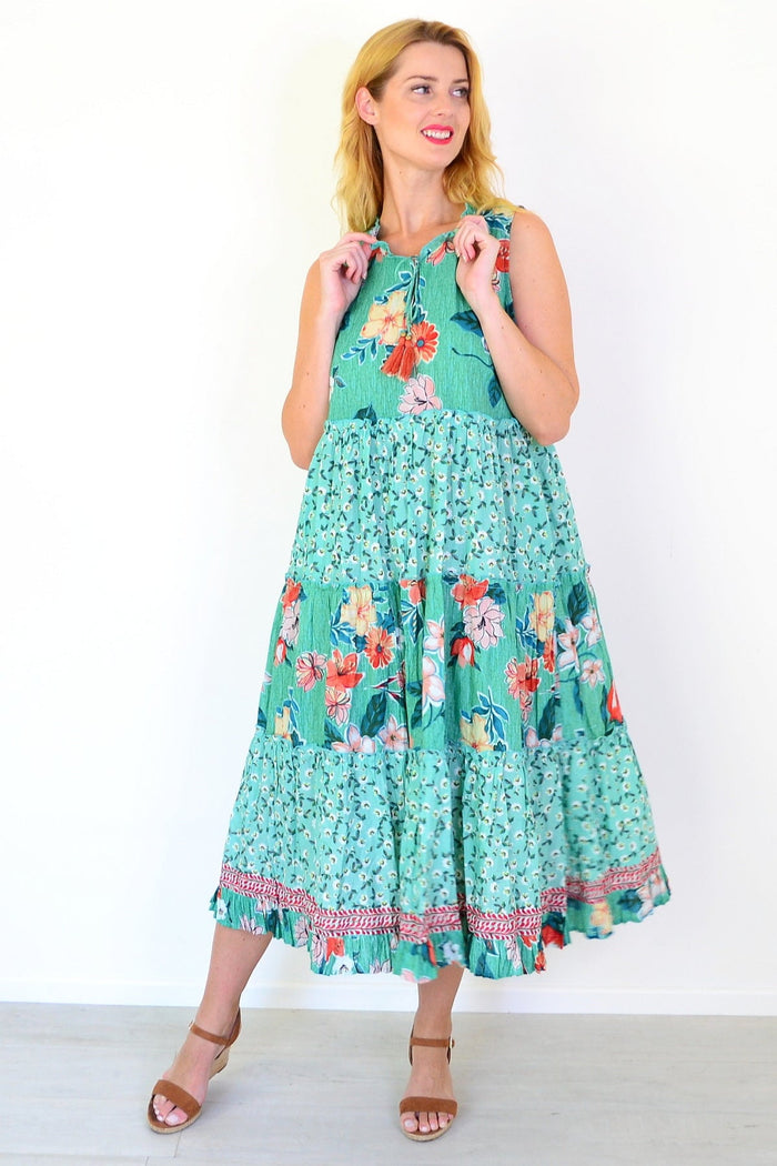 Sleeveless Kaleici floral tunic dress by Orientique featuring a vibrant floral pattern and lightweight fabric.