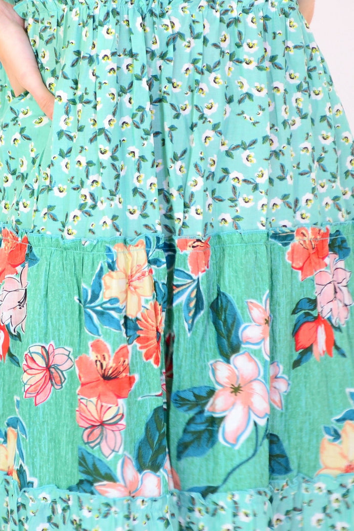 Sleeveless Kaleici floral tunic dress by Orientique, featuring vibrant floral patterns and lightweight fabric for warm weather.