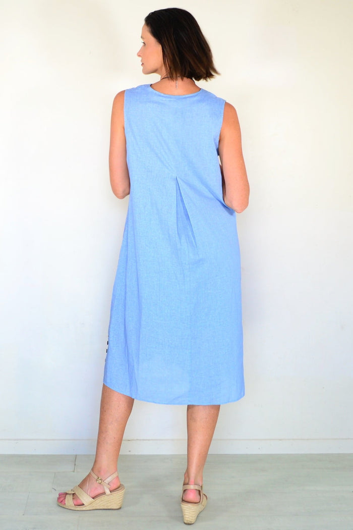 Light blue sleeveless tunic dress by Willow Tree, featuring a relaxed fit and simple design, displayed on a hanger.