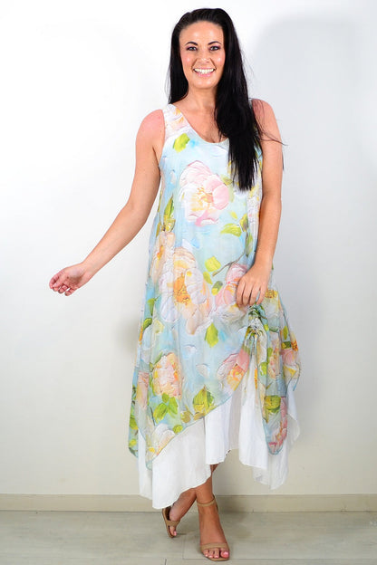 Soft blue and pink floral sleeveless tunic dress by Cali&Co, featuring a flowy design and vibrant floral pattern.