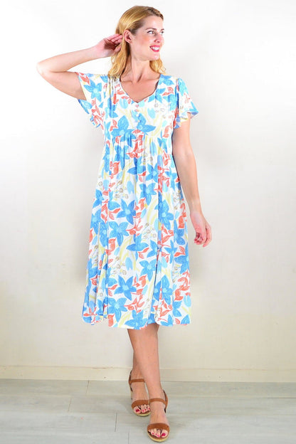 Hourglass Soft Garden Floral Tunic Dress, lightweight tunic with vibrant floral pattern and flowing fabric, perfect for casual wear.