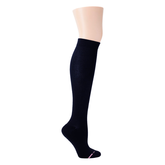 Knee-high compression sock in solid navy with ribbed texture and cushioned footbed.