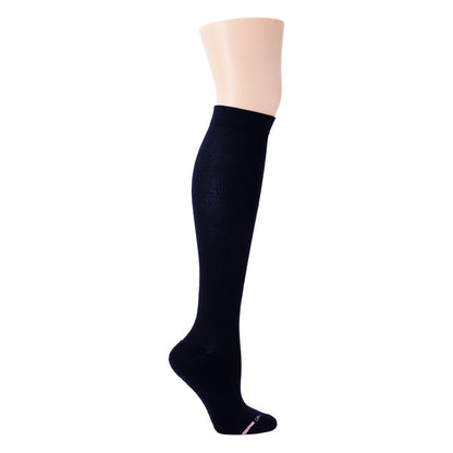 Knee-high compression sock in solid navy with ribbed texture and cushioned footbed.