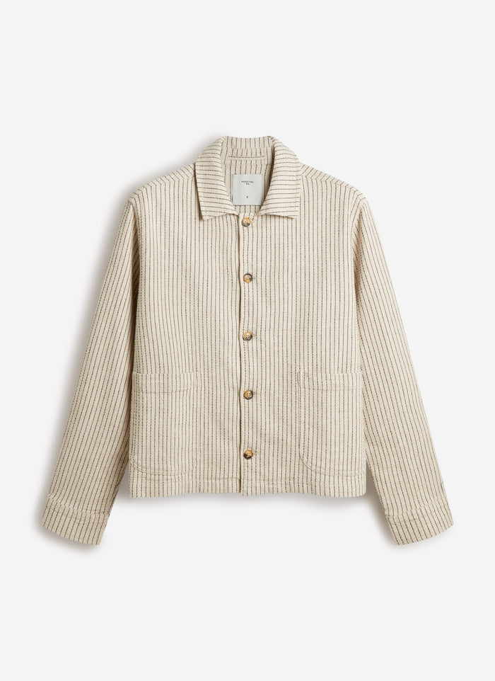 The Percival Sorrento Boxy Overshirt in ecru linen-cotton, featuring a vertical textured weave and contrast buttons.