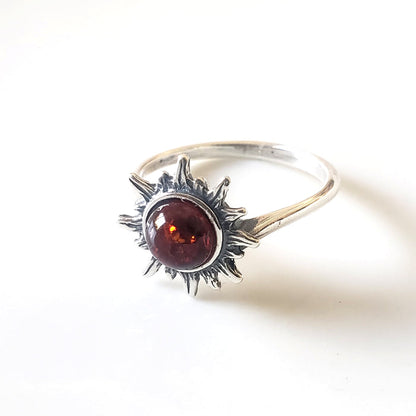 sun ring with amber in a middle