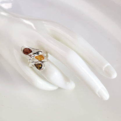 long silver ring with multi stone amber