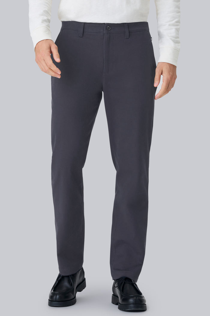 Front view of a man wearing Stretch Twill Chino Relaxed Pant in Night Sky