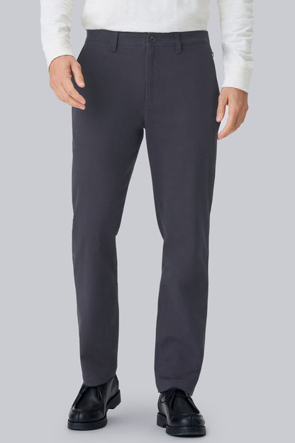 Front view of a man wearing Stretch Twill Chino Relaxed Pant in Night Sky