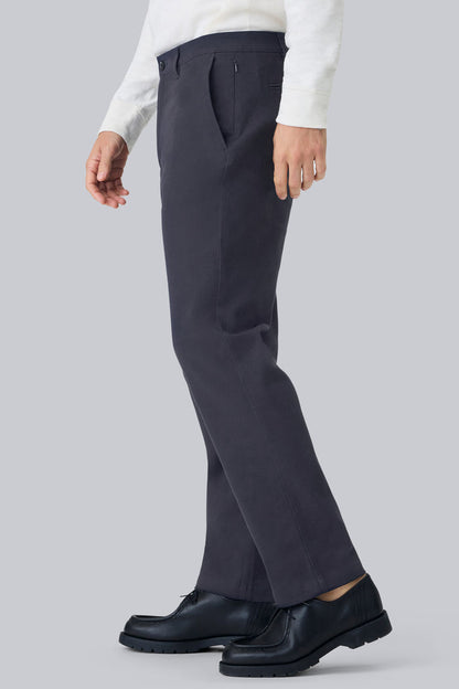 Side view of a man wearing Stretch Twill Chino Relaxed Pant in Night Sky