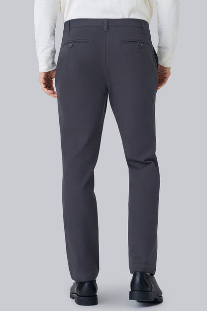 Back view of a man wearing Stretch Twill Chino Relaxed Pant in Night Sky