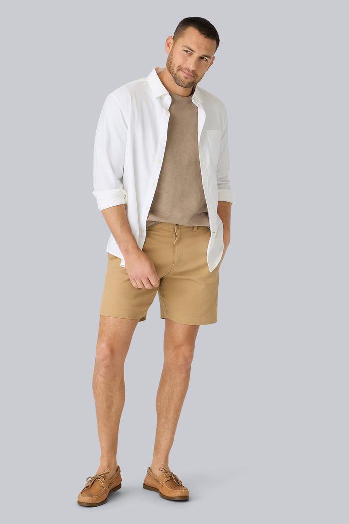 Full front view of a man wearing Stretch Twill Chino Shorts 7" in Sisal