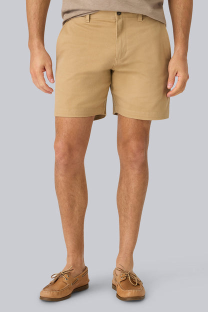 Front view of a man wearing Stretch Twill Chino Shorts 7" in Sisal